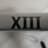 -[XIII]-